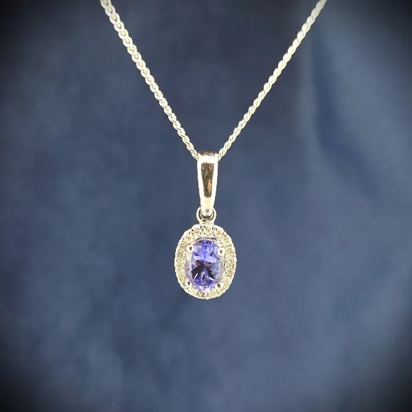 Oval Tanzanite & Diamond Halo Pendant