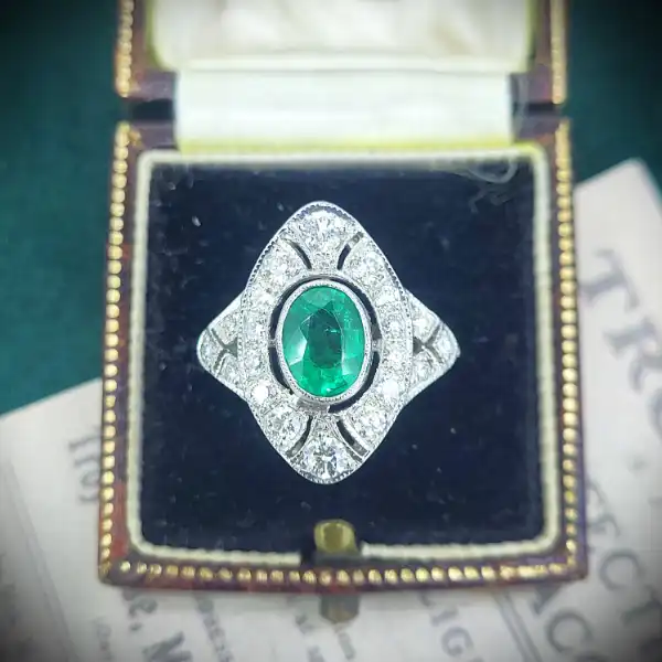 Exquisite Emerald and Diamond Art Deco Ring in Platinum